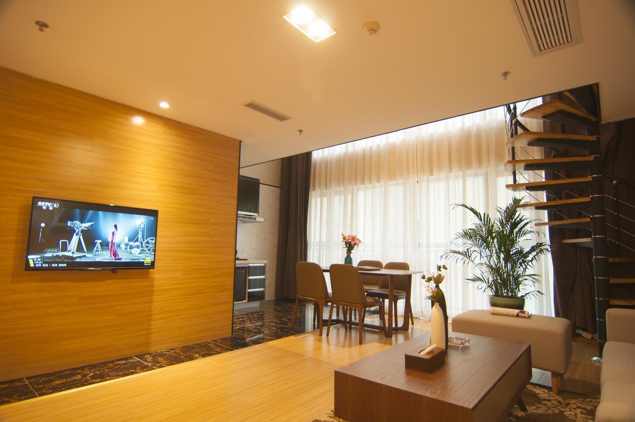 Home Plus Suite Hotel And Apartment Wuhan Buitenkant foto